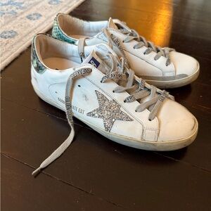 Golden Goose White and Silver Sneakers with Distressed Look and Star Design
